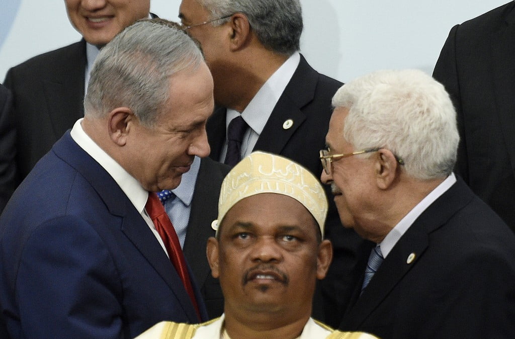 President Ikililou Dhoinine during the family photo during the COP21, United Nations Climate Change Conference, in Le Bourget, outside Paris, on November 30, 2015. More than 150 world leaders are meeting under heightened security, for the 21st Session of the Conference of the Parties to the United Nations Framework Convention on Climate Change (COP21/CMP11), also known as "Paris 2015" from November 30 to December 11. AFP PHOTO / POOL / MARTIN BUREAU / AFP / POOL / MARTIN BUREAU